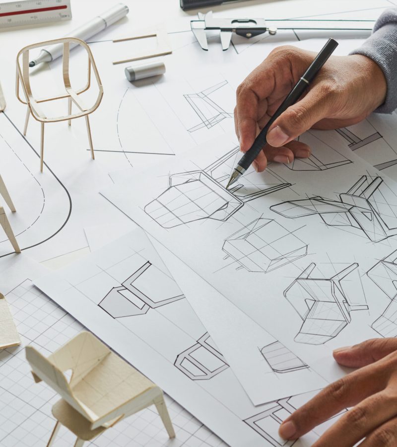 Designer sketching drawing design development product plan draft chair armchair Wingback Interior furniture prototype manufacturing production. designer studio concept .